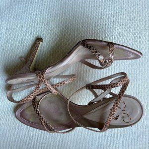 Strappy pink tone snakeskin heeled sandals